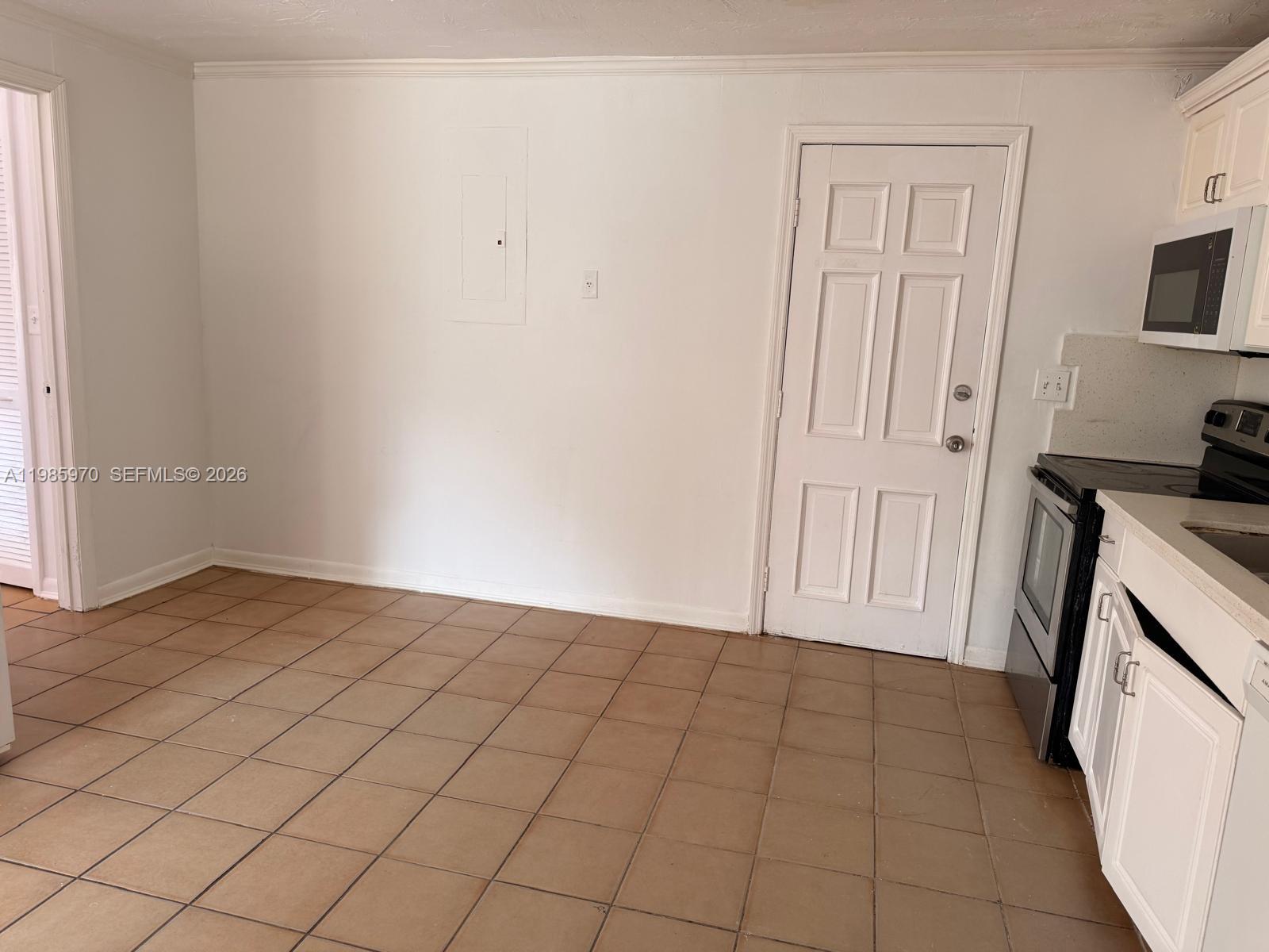 409 Northwest 33rd Street, Unit 1 Miami, FL 33127 - Photo 14 of 17 a view of a kitchen with a sink