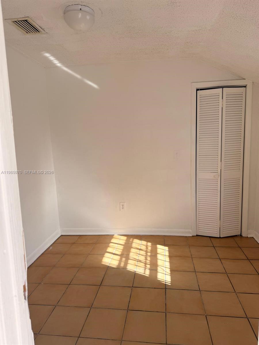 409 Northwest 33rd Street, Unit 1 Miami, FL 33127 - Photo 10 of 17 a view of empty room