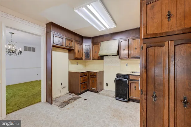 a living room with hard wood floor