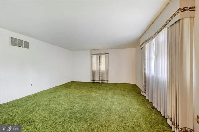 a view of an empty room with window