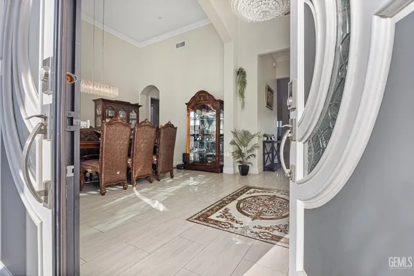 a bathroom with a shower and a sink