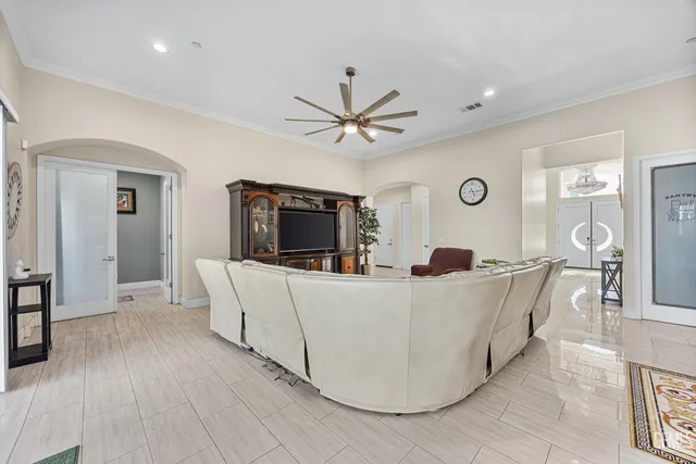 a kitchen with stainless steel appliances a stove a sink and a refrigerator