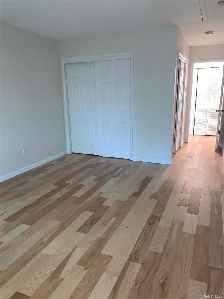 85 North Middletown Road, Unit D2 Nanuet, NY 10954 - Photo 6 of 14 Spacious bedroom with wood floors and 2 double closets