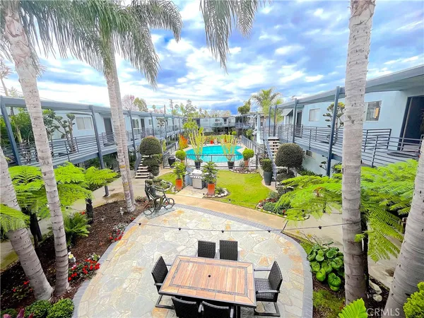 a view of yard with an outdoor seating