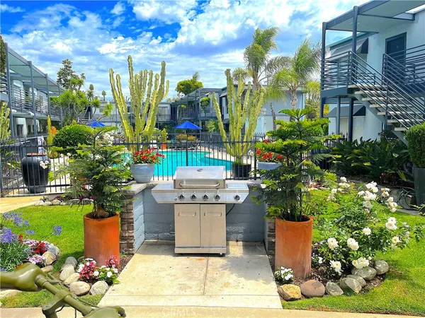 a view of yard with an outdoor seating