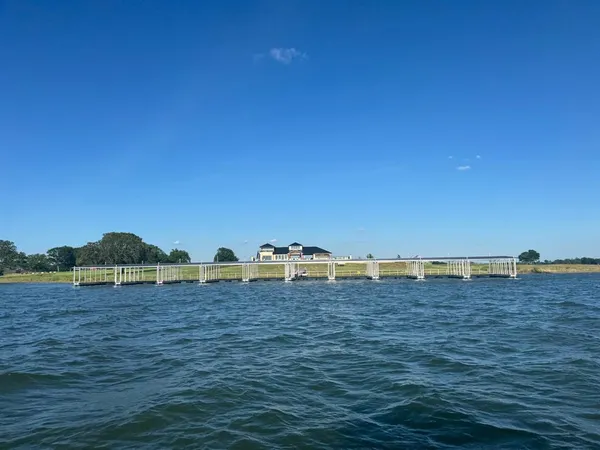a view of a swimming pool and an outdoor space