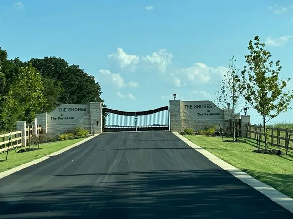 an aerial view of a residential houses with outdoor space