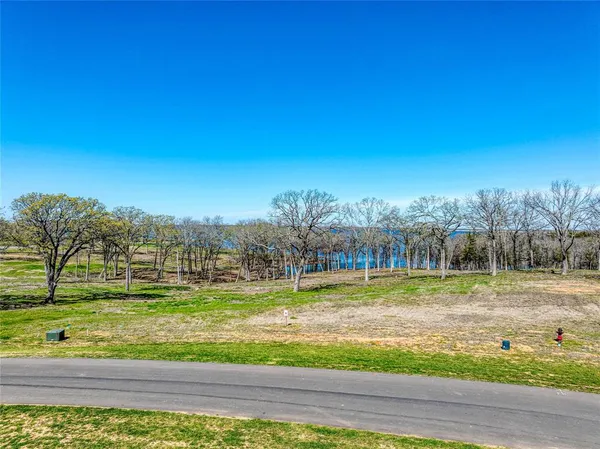 a view of a swimming pool with an ocean view