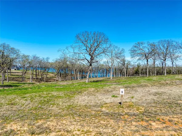 a view of a street with a park