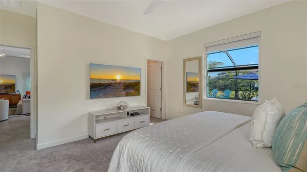 a bathroom with a double vanity sink mirror and shower