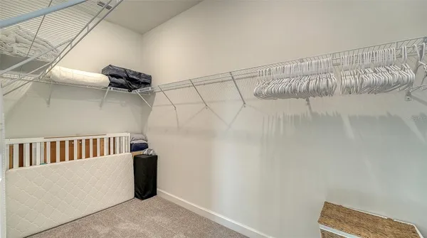 a bathroom with a sink mirror and shower