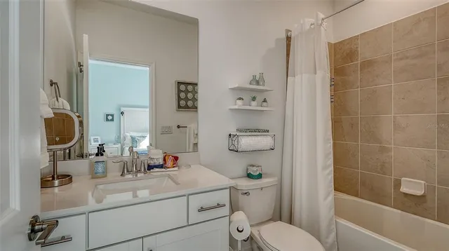 a view of a swimming pool with a patio