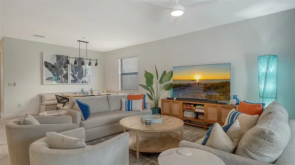 a living room with furniture and window