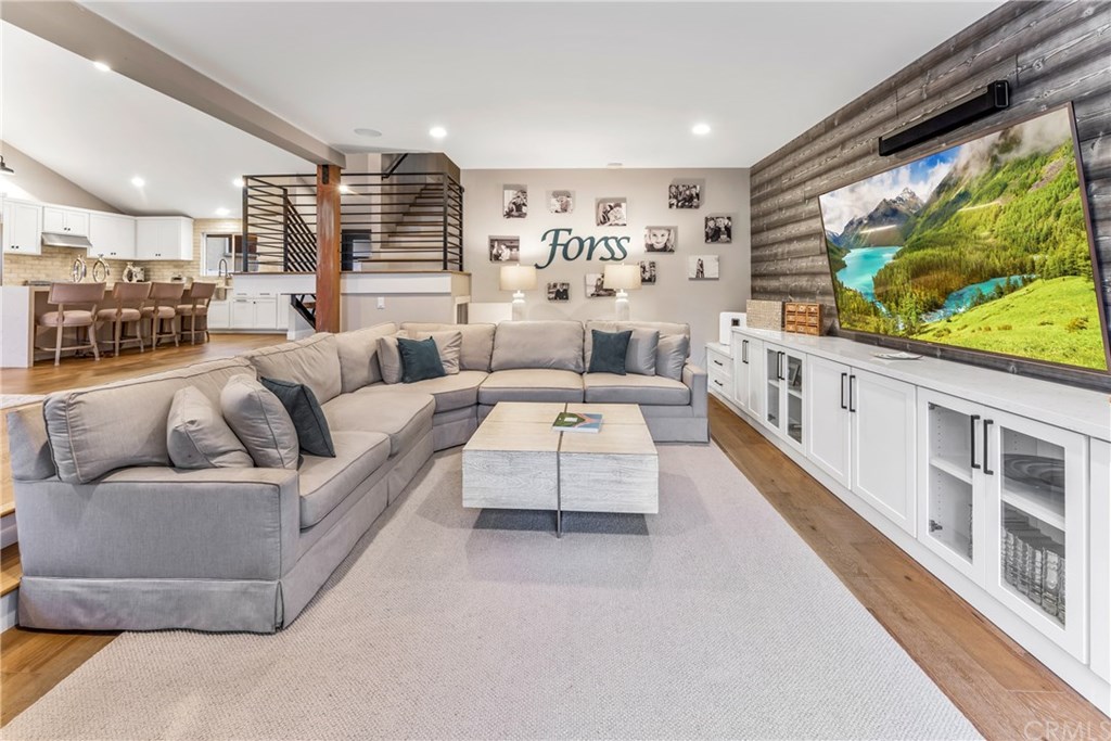 720 Sandpiper Drive Seal Beach, CA 90740 - Photo 13 of 69 Custom built-ins with designer accents make the living room an inviting and useable space.