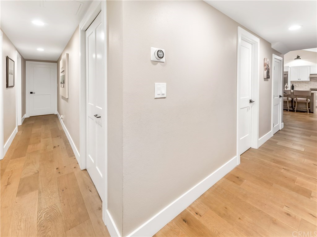 720 Sandpiper Drive Seal Beach, CA 90740 - Photo 27 of 69 The main floor bedrooms (4) wrap around the back of the home offering much privacy from the kitchen/living space.