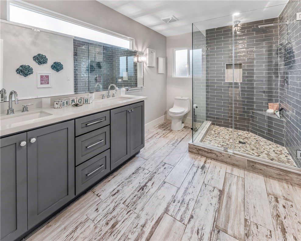 720 Sandpiper Drive Seal Beach, CA 90740 - Photo 30 of 69 Secondary master on main floor has a beautiful bathroom.