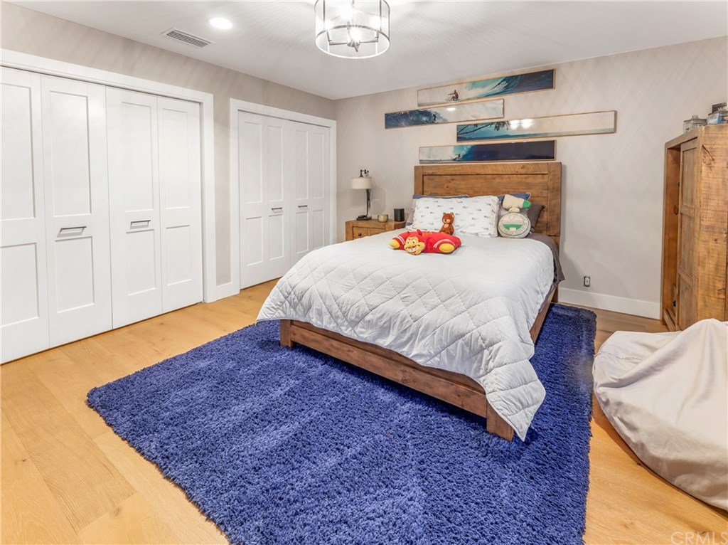 720 Sandpiper Drive Seal Beach, CA 90740 - Photo 31 of 69 Main floor bedroom with excellent finished closet space.