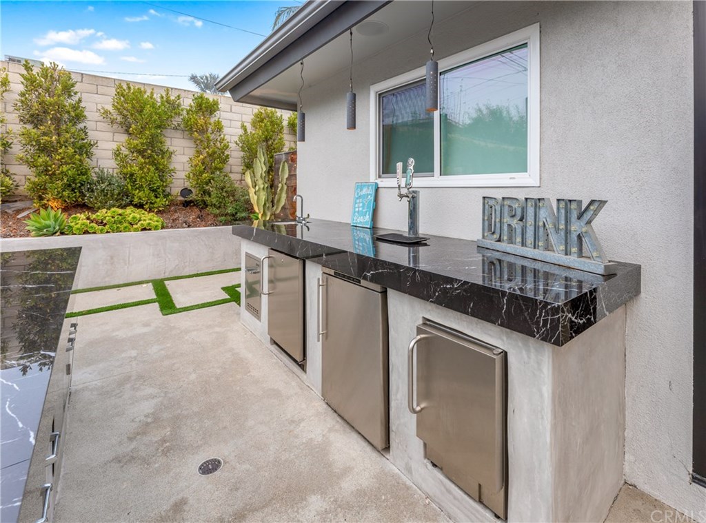 720 Sandpiper Drive Seal Beach, CA 90740 - Photo 55 of 69 Detail of the bar area in the backyard. Stainless built-ins.