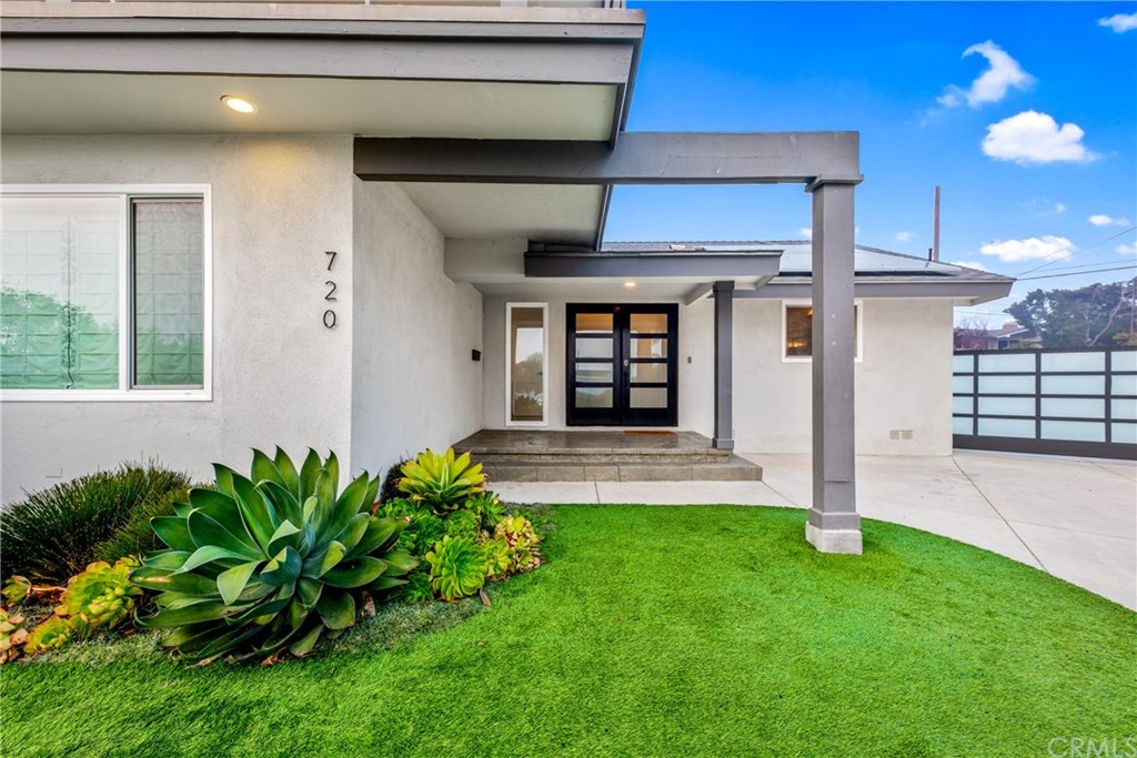 720 Sandpiper Drive Seal Beach, CA 90740 - Photo 60 of 69 Entry with gated driveway.