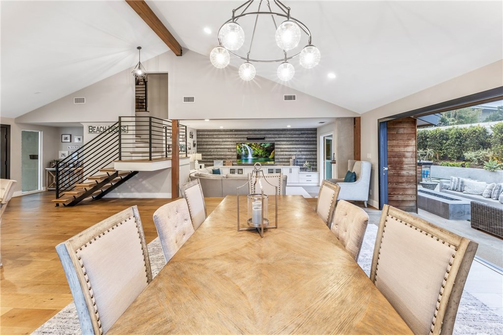 720 Sandpiper Drive Seal Beach, CA 90740 - Photo 8 of 69 The formal dining space transitions perfectly to the glamourous living room and the amazing outdoor entertaining area.