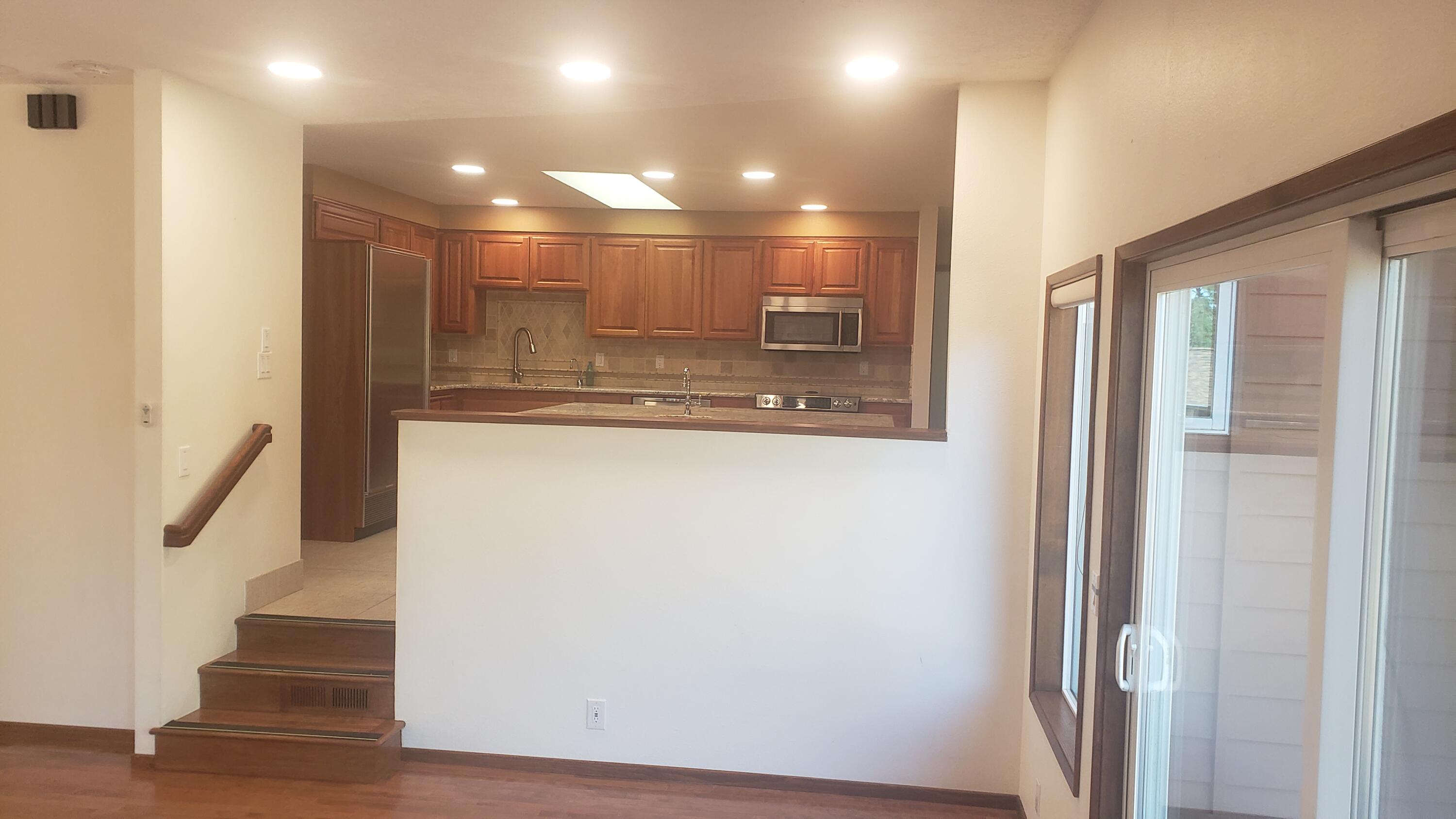 60305 Woodside Road Bend, OR 97702 - Photo 12 of 35 View from the family looking to the kitchen