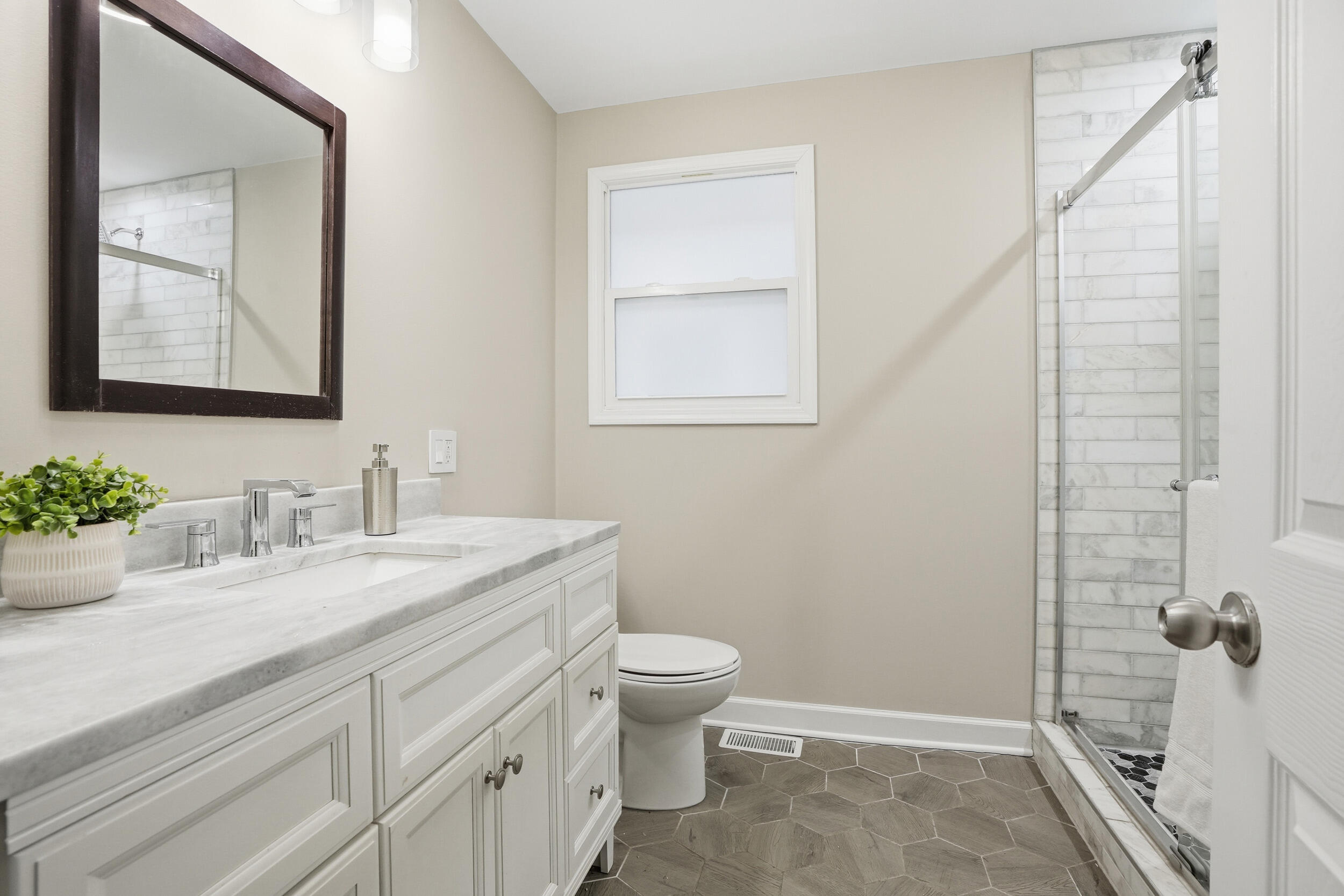 2406 Birch Avenue Whiting, IN 46394 - Photo 14 of 16 a bathroom with a granite countertop sink toilet and shower
