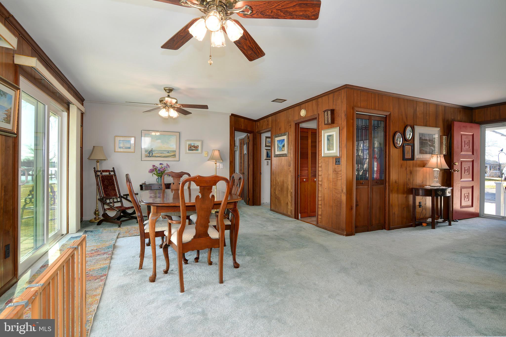 5134 Paw Paw Road Cambridge, MD 21613 - Photo 14 of 32 Hardwood under carpet