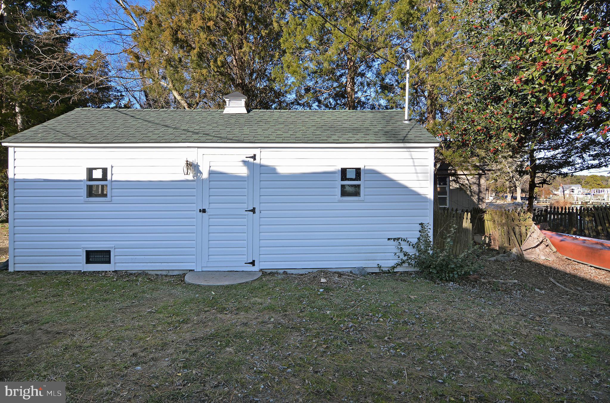 5134 Paw Paw Road Cambridge, MD 21613 - Photo 26 of 32 side entrance to garage