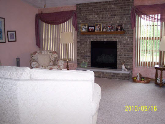 2071 Hillsdown Road Lake Summerset, IL 61019 - Photo 3 of 11 a living room with furniture and a fireplace
