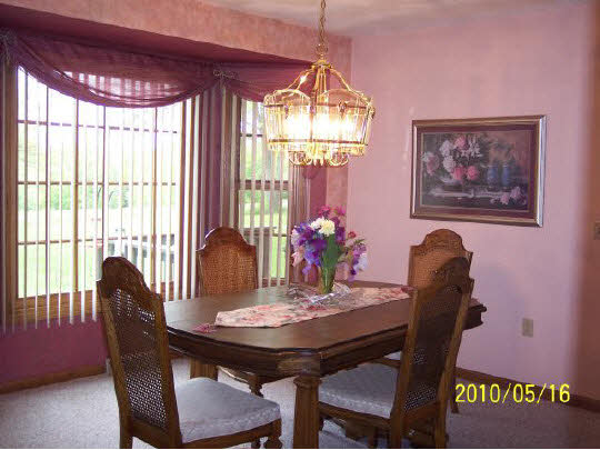 2071 Hillsdown Road Lake Summerset, IL 61019 - Photo 4 of 11 a view of a dining room with furniture and window