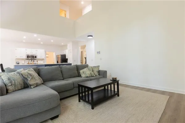 a living room with furniture and a couch
