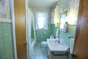 668 Long Pond Road Greece, NY 14612 - Photo 8 of 17 BATHROOM NCLUDES VANITY, UB/SHOWER, LINEN CLOSET