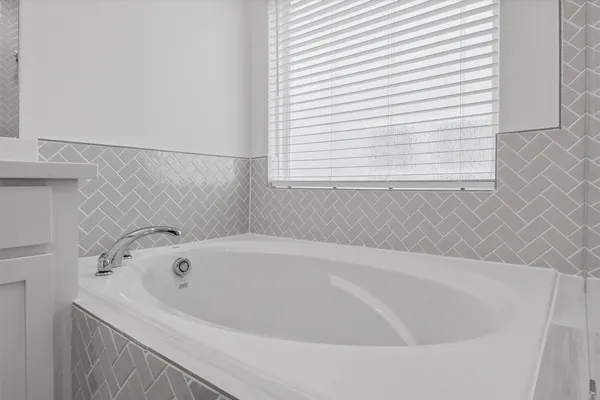 a bathroom with a shower and toilet