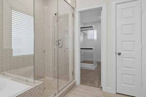 a view of an empty walk in closet