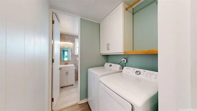 a utility room with dryer and washer