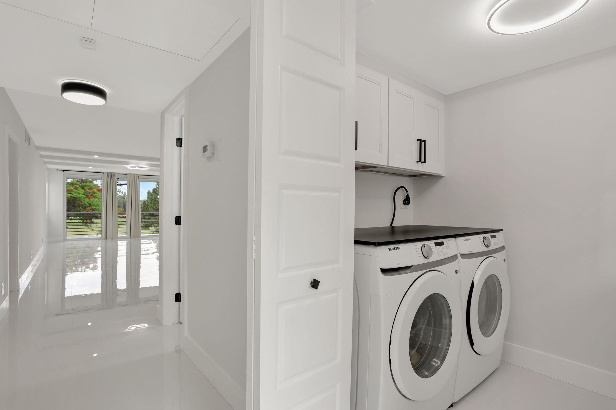 3505 Oaks Way, Unit 204 Pompano Beach, FL 33069 - Photo 30 of 36 Laundry