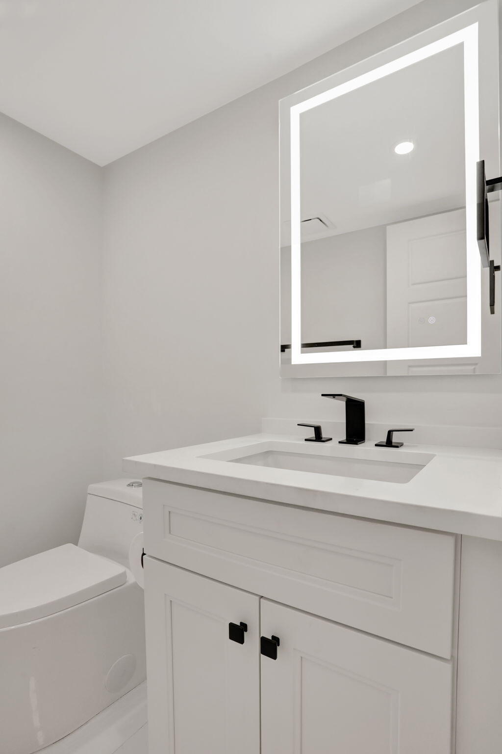3505 Oaks Way, Unit 204 Pompano Beach, FL 33069 - Photo 31 of 36 Half Bathroom