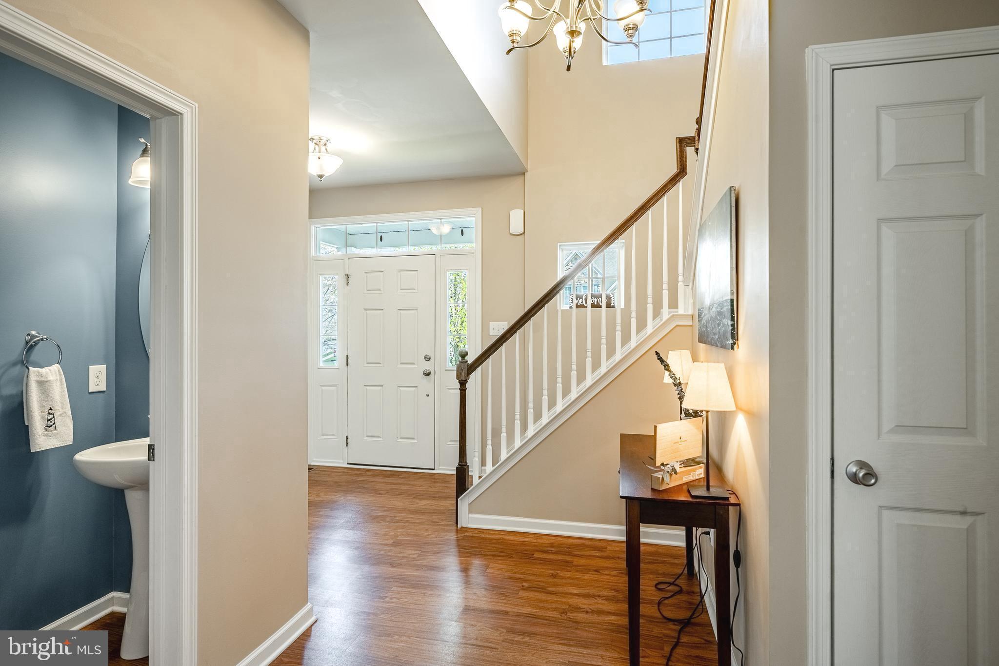 1345 Northumberland Road Coatesville, PA 19320 - Photo 11 of 52 a view of a hallway with wooden floor and entryway