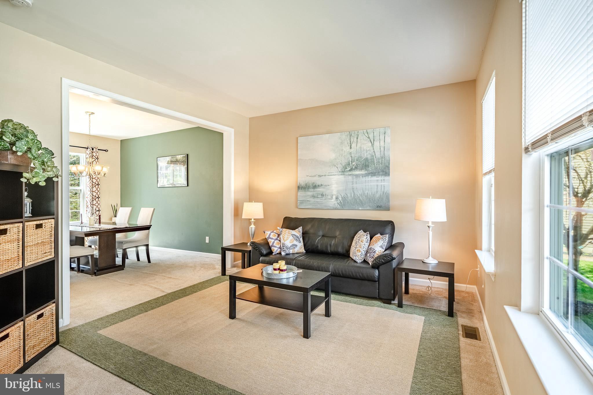 1345 Northumberland Road Coatesville, PA 19320 - Photo 13 of 52 a living room with furniture and a rug