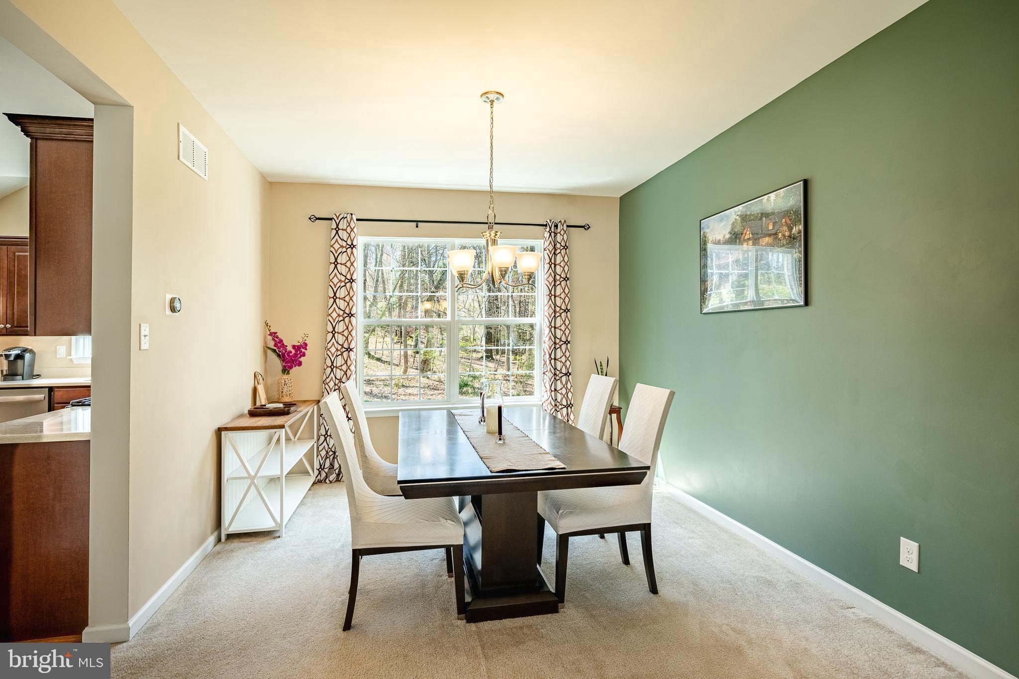 1345 Northumberland Road Coatesville, PA 19320 - Photo 15 of 52 a view of a dining room with furniture window and outside view