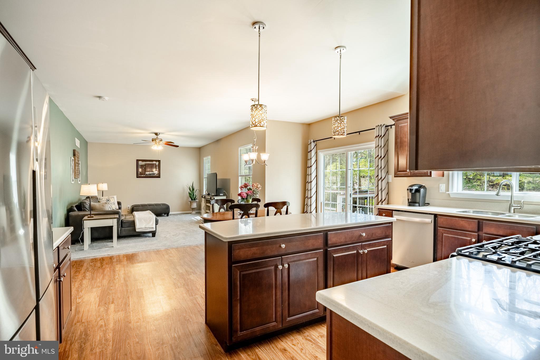 1345 Northumberland Road Coatesville, PA 19320 - Photo 16 of 52 a kitchen with sink cabinets and dining table