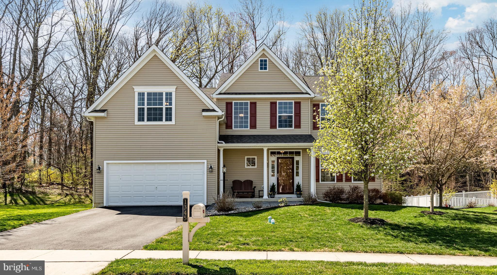 1345 Northumberland Road Coatesville, PA 19320 - Photo 2 of 52 a front view of a house with a yard