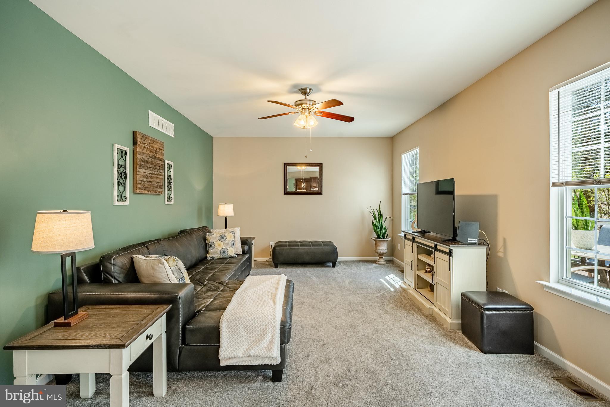 1345 Northumberland Road Coatesville, PA 19320 - Photo 22 of 52 a living room with furniture and a flat screen tv