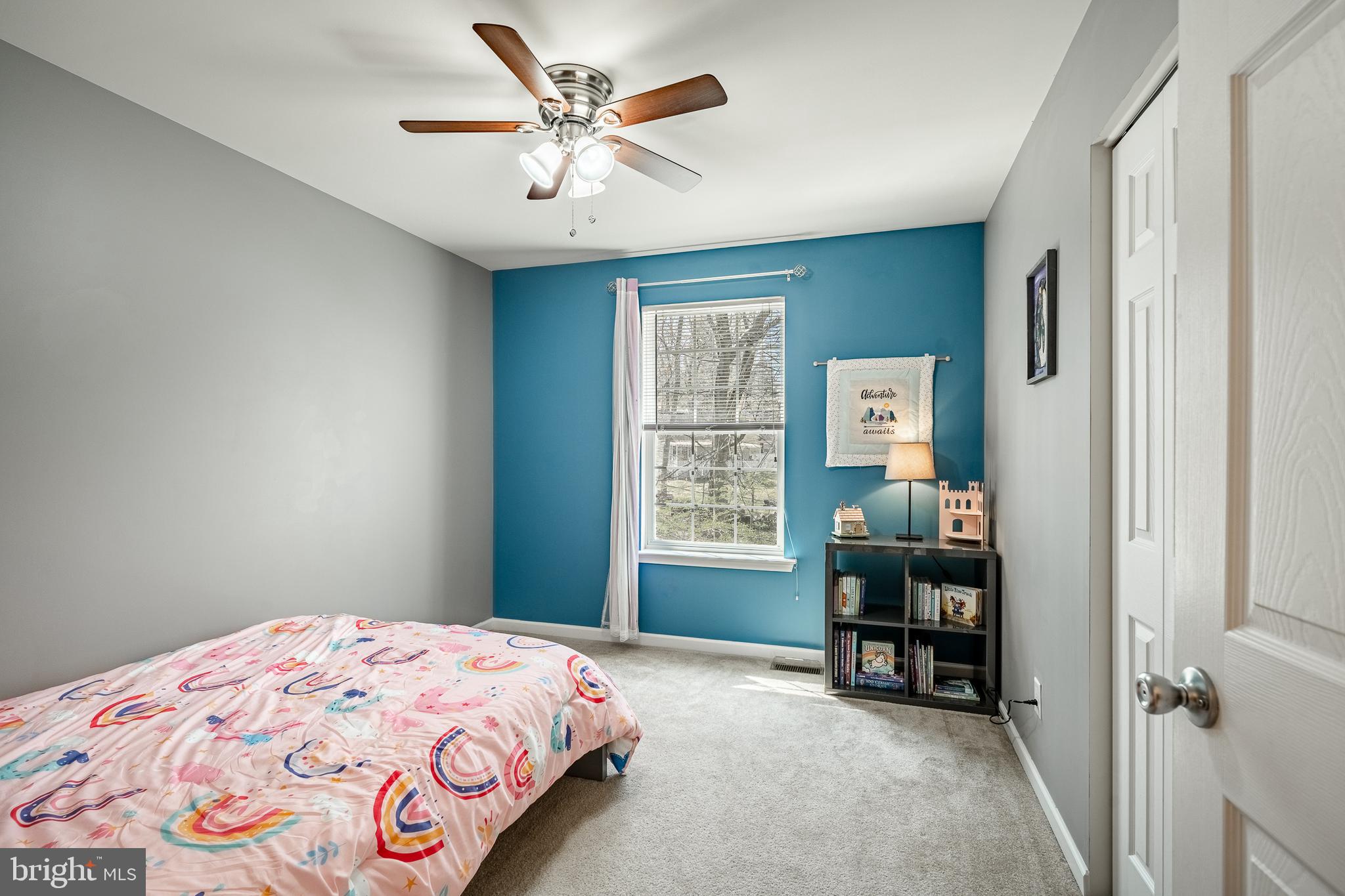 1345 Northumberland Road Coatesville, PA 19320 - Photo 36 of 52 a bedroom with a bed and a chandelier