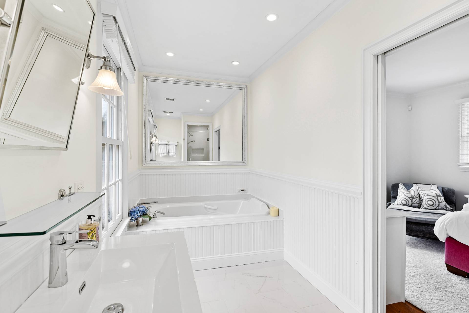 5 Coves End Lane Sag Harbor, NY 11963 - Photo 11 of 26 a bathroom with a bathtub and a sink