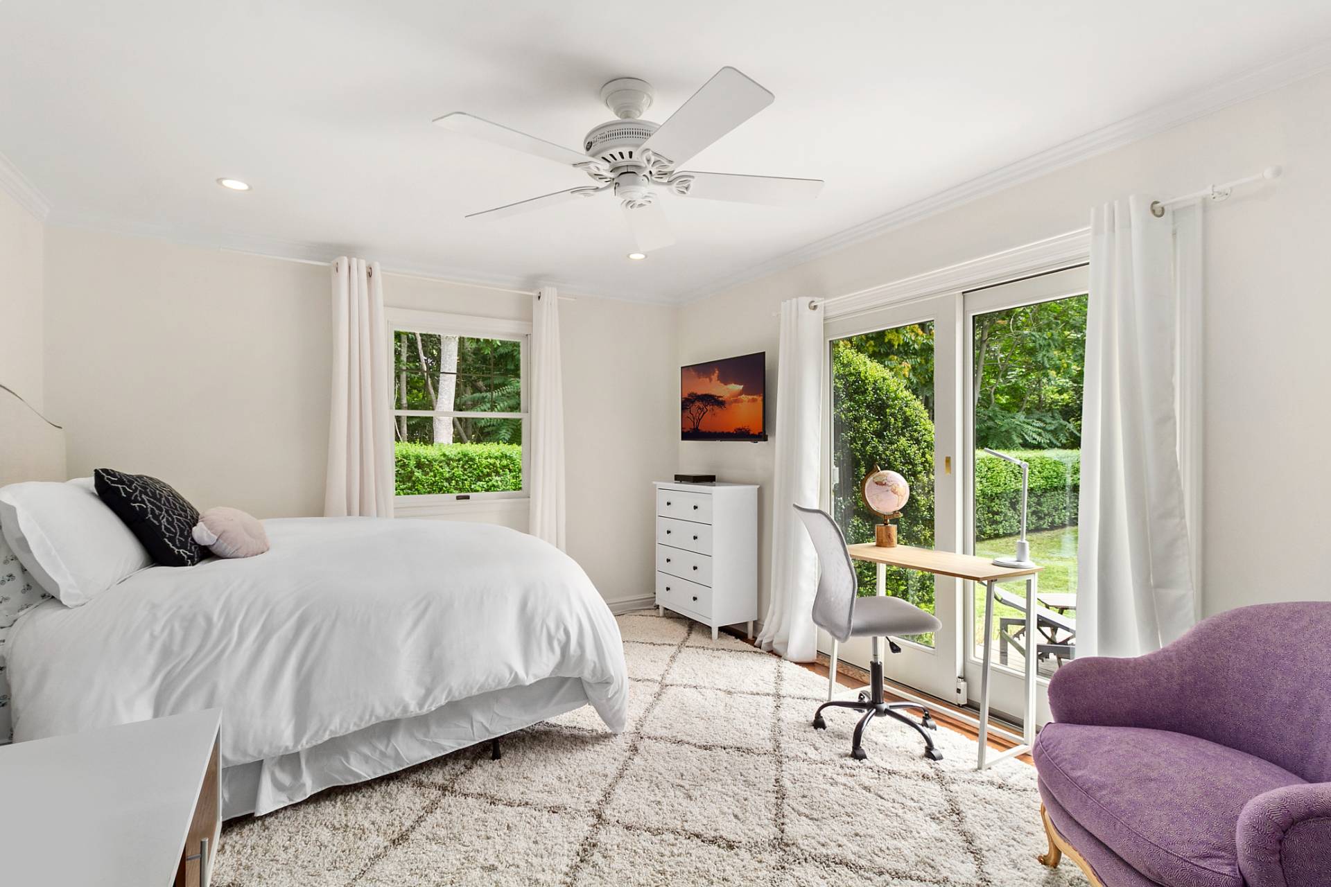 5 Coves End Lane Sag Harbor, NY 11963 - Photo 12 of 26 a bedroom with a large bed and a window