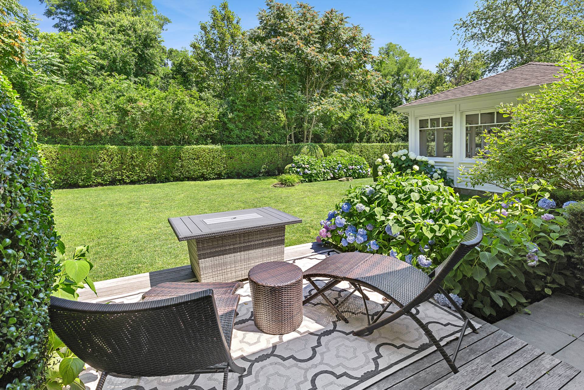 5 Coves End Lane Sag Harbor, NY 11963 - Photo 13 of 26 a view of a backyard with sitting area