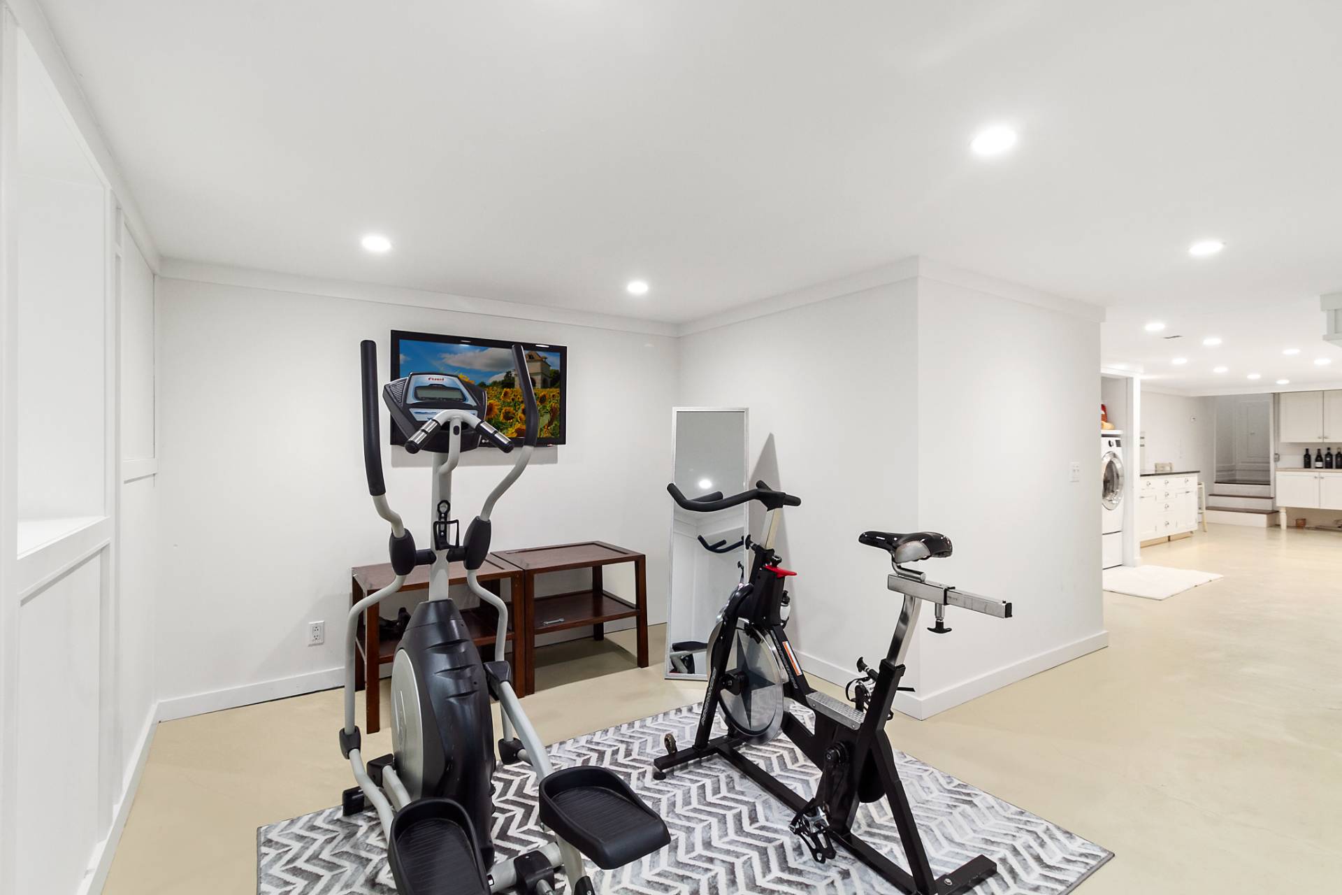 5 Coves End Lane Sag Harbor, NY 11963 - Photo 18 of 26 a view of a room with gym equipment