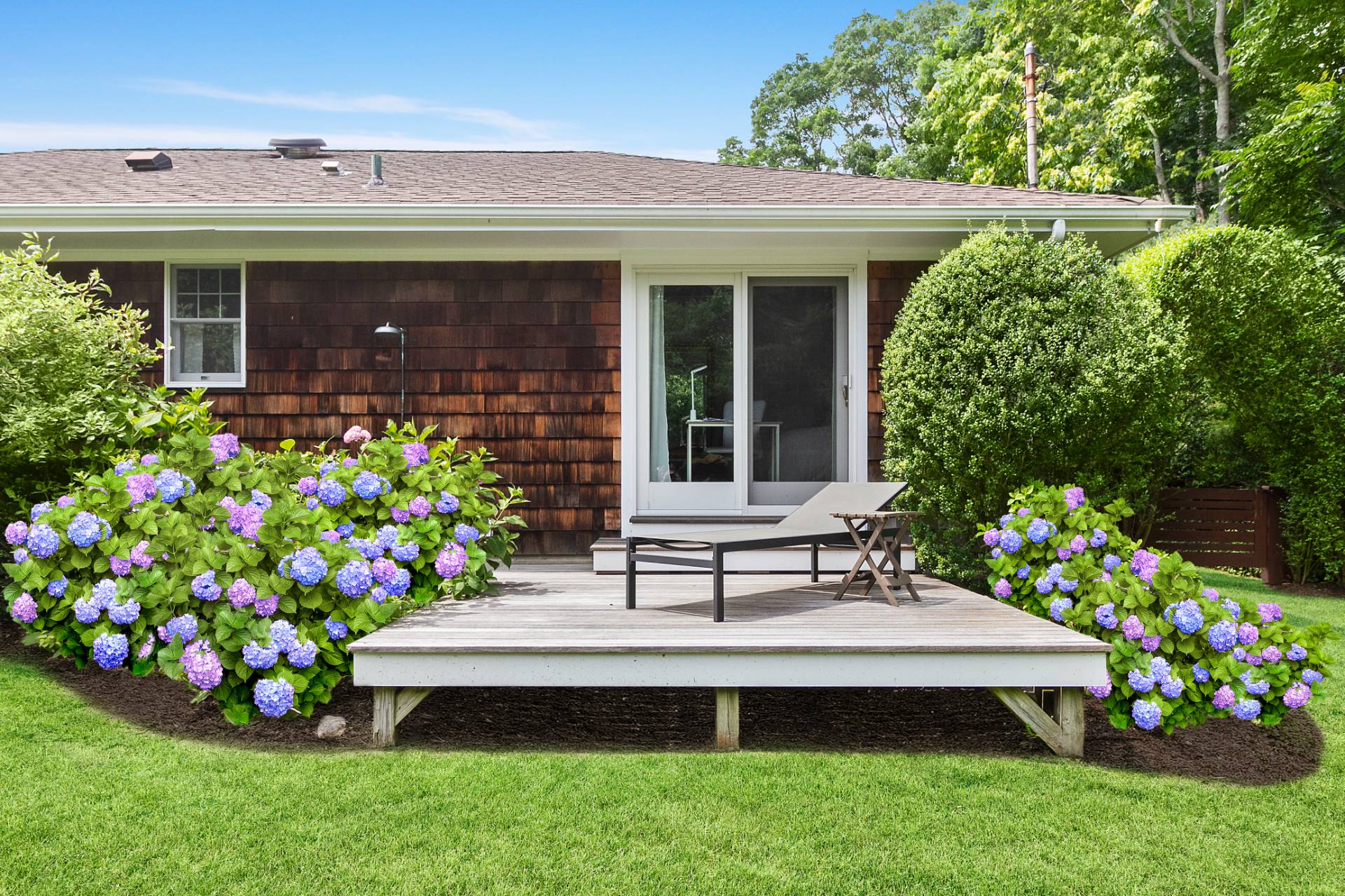 5 Coves End Lane Sag Harbor, NY 11963 - Photo 26 of 26 a view of a house with a big yard and potted plants