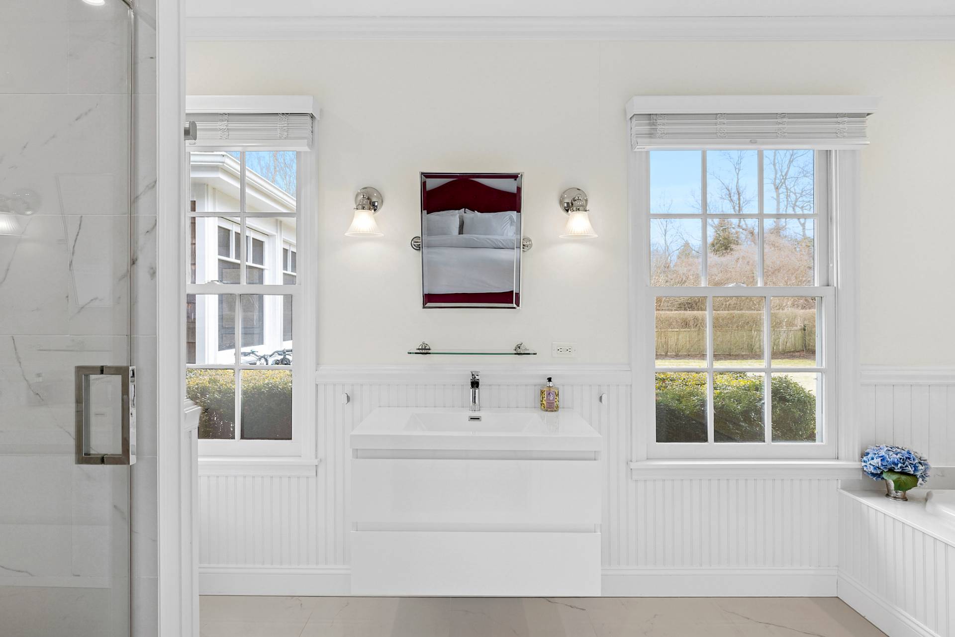5 Coves End Lane Sag Harbor, NY 11963 - Photo 10 of 26 a bathroom with a bathtub and a shower